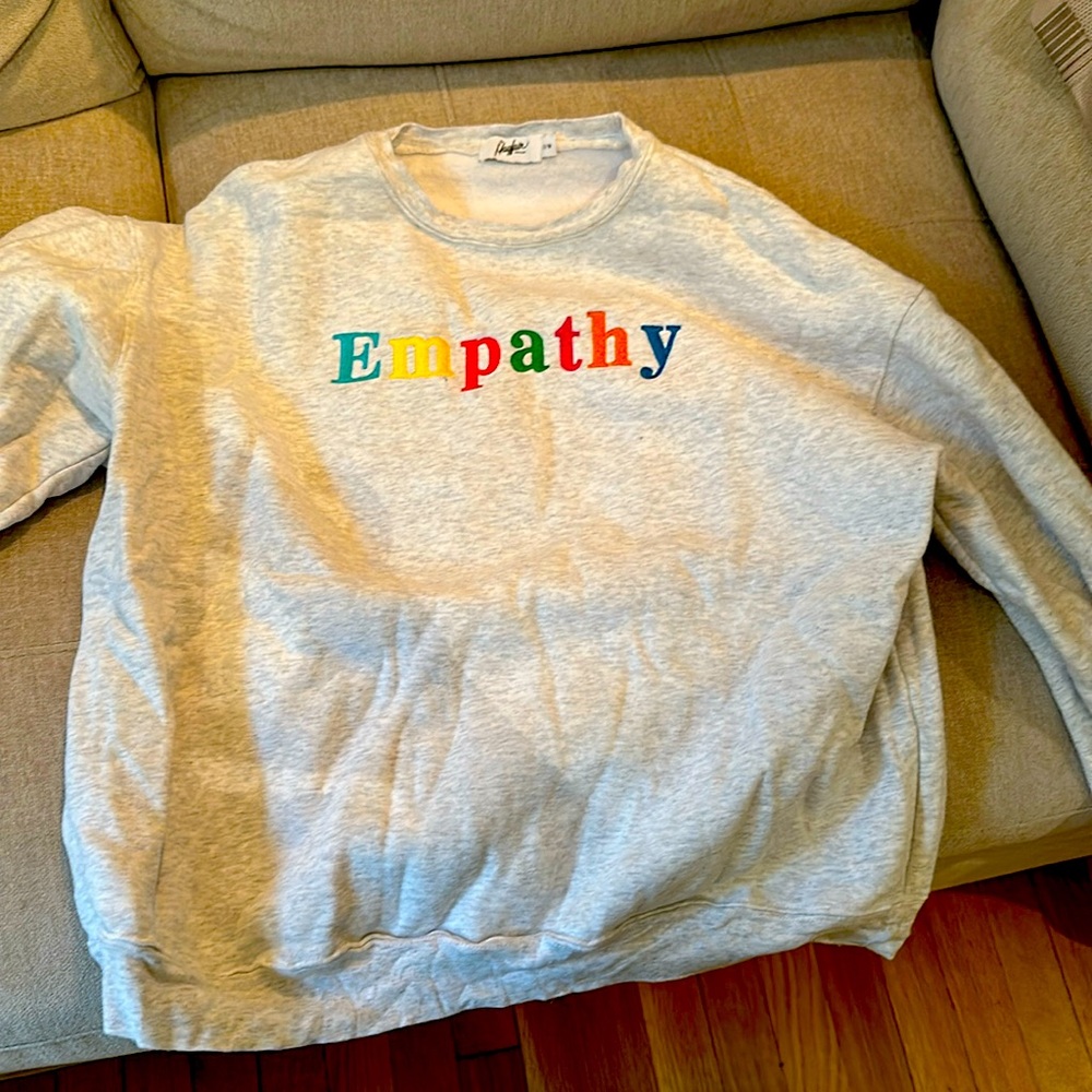 only worn a couple times. Sz small and runs oversized